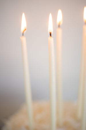 Tall Skinny Birthday Taper Candles - Color: Buttermilk - 12 ct